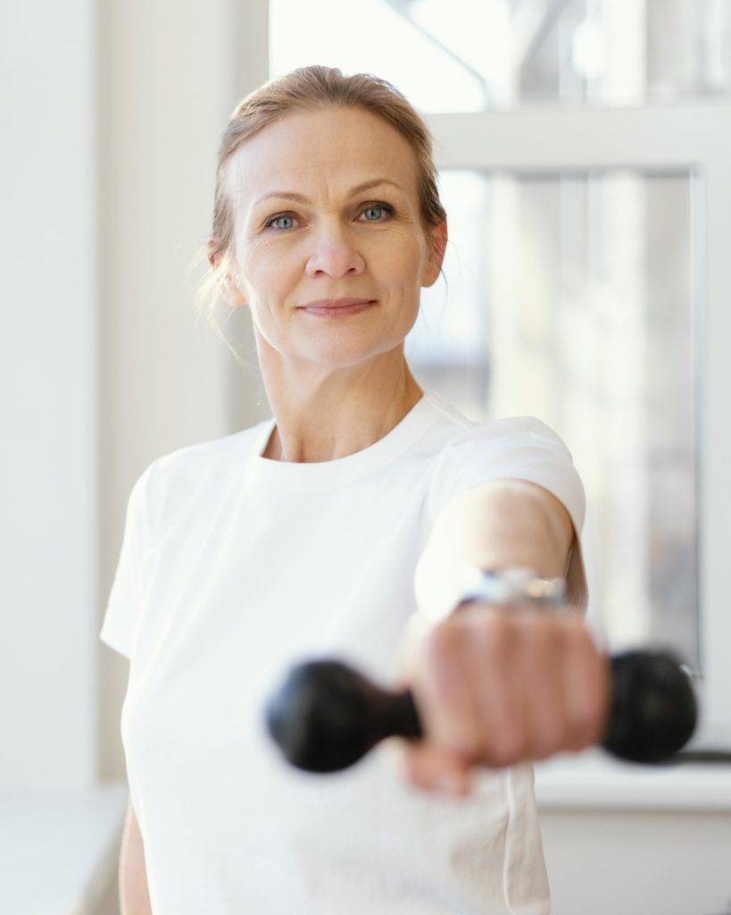 Middle-age woman knows the importance of magnesium and its ability to prevent osteoporosis.